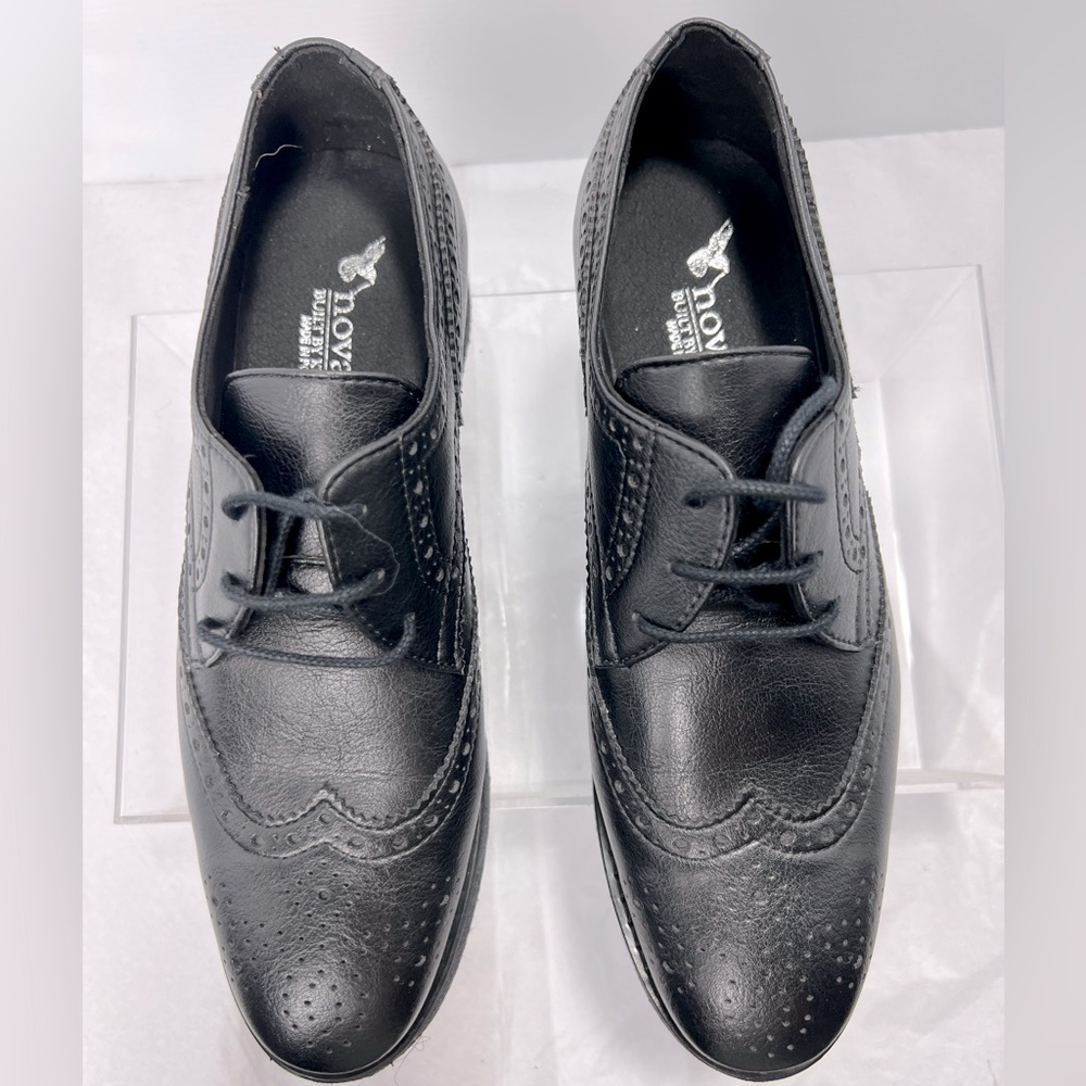 Novacas vegan black wing tip rubber wedge shoe. Color black, size 39.